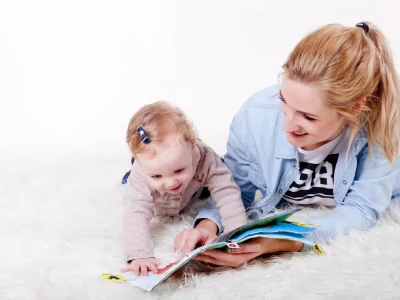 parent with child reading book